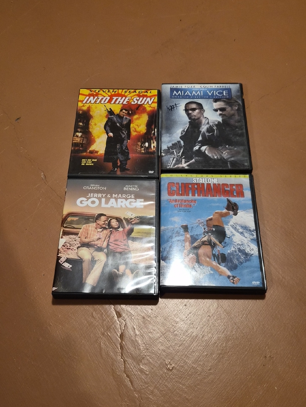 Assorted DVD Movie Lot — Into the Sun, Miami Vice, Go Large, Cliffhanger